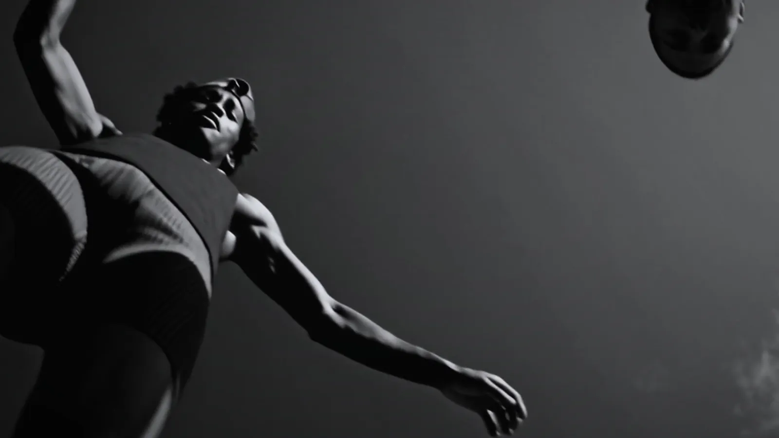 Two figures suspended mid-air in a grey void